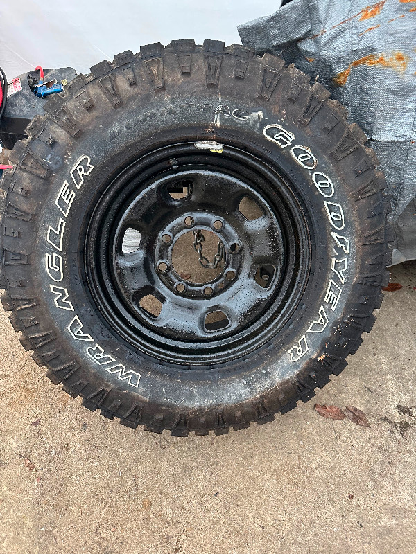 Never used Goodyear duratrac on 2500 ram rim in Tires & Rims in Muskoka