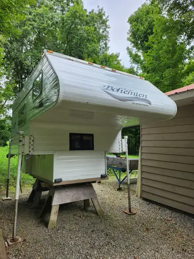 Turn-key boondocking slide in camper Made in Canada 2004 Le Bohemien 8.0S restored in 2023. Includes...