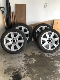 Selling a set of 4 winter Bridgestone Blizzak tires for a BMW 3 Series with BMW OEM Alloy Rims. Size...