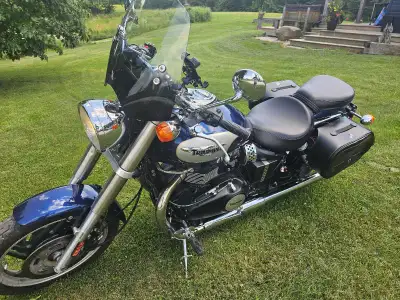 Low KM Triumph in excellent shape. 2nd owner for last 15+ years stored inside heated new starter, ba...