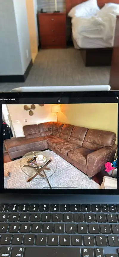 2 YO couch and coffee/foot stool for sale. Good shape no tears or scratches. Soft stain resistant le...