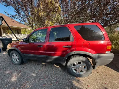 Ford Escape XLT model year 2004 with 3.0 liter V6 automatic with 4x4 option. Very nice condition. Ha...