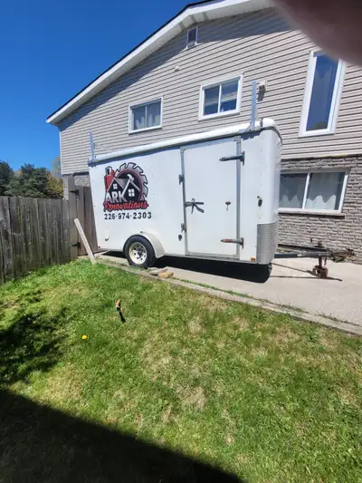 Selling 6x12 enclosed cargo trailer. Solid frame. Rear ramp door. Side man door. Ladder racks on roo...