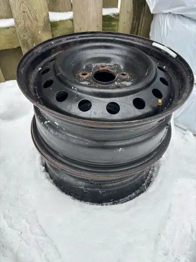 Rims I bought but they didn’t fit my car I just want them out of my driveway