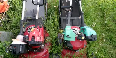 Four curved shaft string trimmers and two push mowers for sale. None of these run currently, no miss...