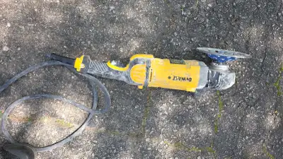 Professional heavy-duty DeWalt grinder/polisher. Tool powers on and runs; however, as soon as it is...