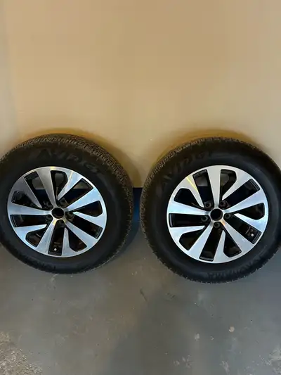 A set of 4 stock Subaru 17 inch rims and tires. Taken off of 24 Outback. Like new. No scuffs or curb...