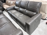 Grey leather power reclining sofa 