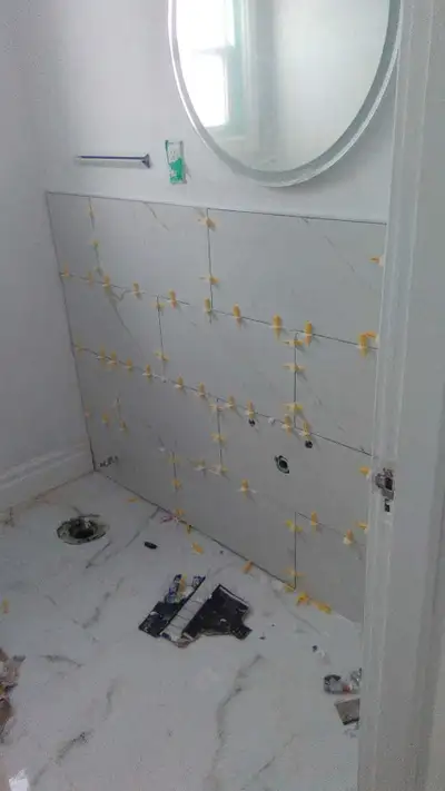 need 250 sqft wall tiles installed walls are prept, View more