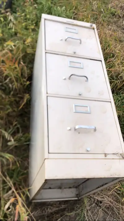 Three drawer filing cabinet with broken handle. $20. I deliver!, View more