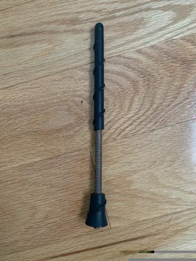 Standard North American Automobile FM Radio Whip Antenna 7" long. Still works perfectly. See picture...
