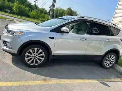 2018 Ford Escape Titanium 4WD for sale, mint condition. Tan leather interior with black. Fully loade...