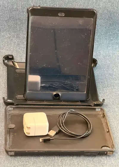 - iPad has almost never been taken out of OtterBox case except to put in SIM card - Case is in good...