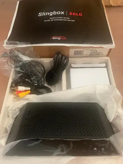 Sling box Solo complete seldom used so selling it. Comes complete with IR, network and rca not even...