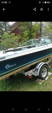 Motorboat with Load Rite trailer.