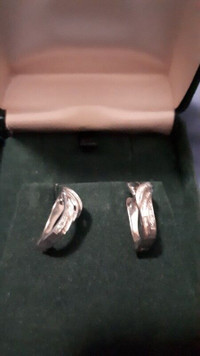 .925 Silver Diamond earrings with $728 appraisal attached. LOOK