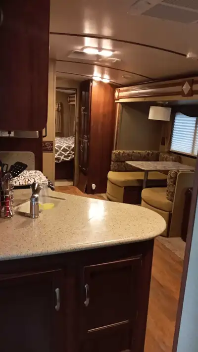 2015 Keystone outback 324cg toy hauler. Ready to go. In excellent condition. Can include Hensley Hit...