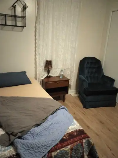 Large furnished room for rent Wifi included Parking Close to mall and errands I an apartment setting...