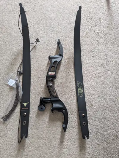 Used Left hand Hoyt Fred Eichler buffalo takedown bow. 19" riser, black. Medium limbs, black, 35 lbs...