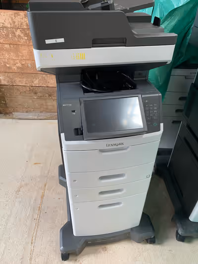 Lexmark mx711de commercial laser printer. I have 14 of these and they have rarely been used and are...