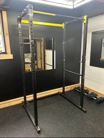 Northern lights power squat rack in great condition, it comes with pull up bar, safety spotter arm a...