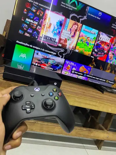 Xbox one with two controllers and 3 games, View more