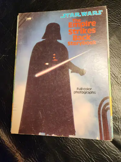 Relive the classic saga with this vintage Star Wars: The Empire Strikes Back storybook, featuring ic...