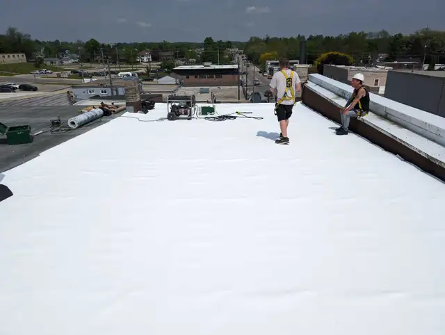 KING FLAT ROOFING577858303983636481
