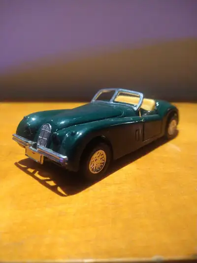 Jaguar XK 120 20$ Argent Comptant