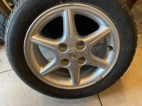 4 Nissan aluminum 16 inch rims