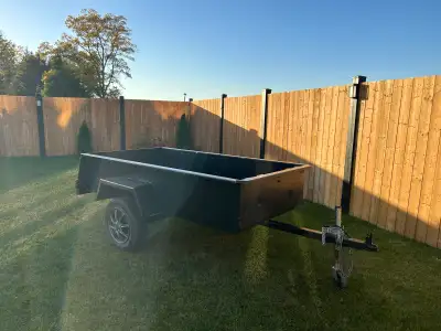4x8 utility trailer, 1 and 7/8in ball. Solid steel, heavy duty. Was used to haul around dirt bikes....