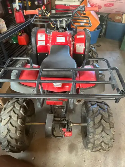 Brand new quad, been used only a couple hours this year. Great ATV for the kids, forward and reverse...