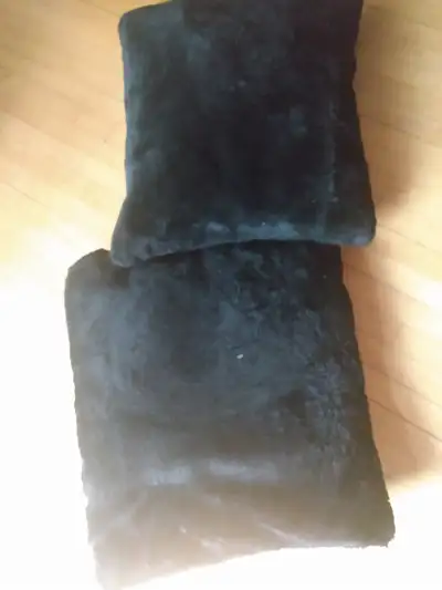 Black furry pillows, View more