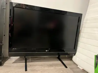 On stands - in good working condition. No scratches or scrapes. No remote or wiring/cables included....