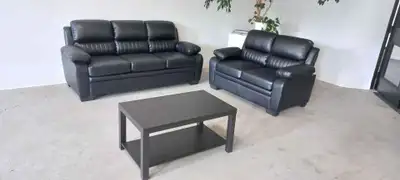 New black leather sofa & love seat (in boxes). Free delivery, View more