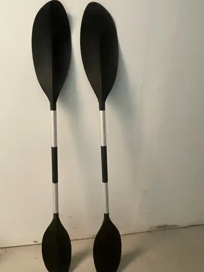 I am selling a pair of Intex kayak paddles, each measuring approximately 140 cm in length with blade...