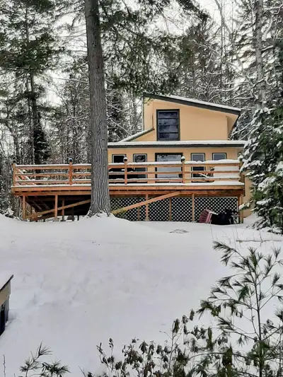 Escape to your own private retreat with this beautiful two-story, three-season cottage nestled on Es...