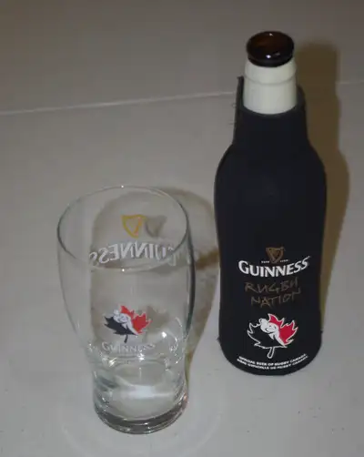 Guinness Rugby Nation beer bottle cozy and  branded Pint glass, View more