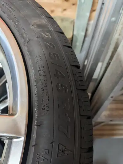 New winter tires on aluminum rims - 225/45 r17. These rims came off a 2016 Audi A3. The tires were p...