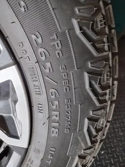 Wheel and tire package, new. Removed from new truck. Complete with tire pressure monitor system, lug...