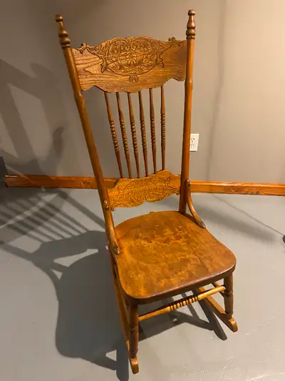 Beautiful pressback nursing rocker. Made of ash, lovely grain. Has a smooth rocking motion.
