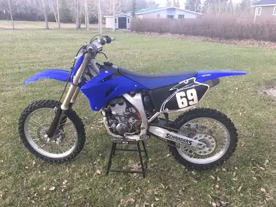rebuilt motor redone front and rear suspension new sprocket new tires new handlebars new chain