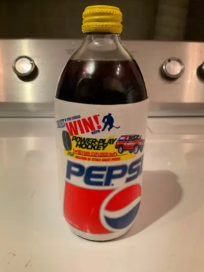 Vintage glass Pepsi Bottle from the 80s $15 firm, View more