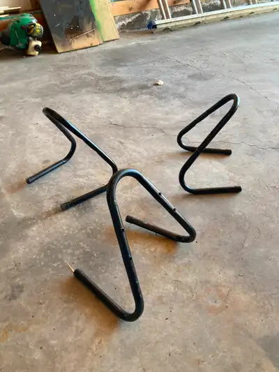 4 Canadian Tire hangars. Painted black so they are even sexier. Screws included. $13.50 + GST new. A...