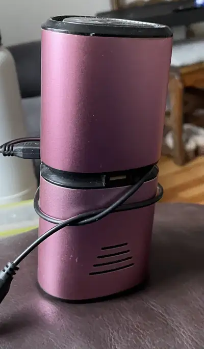Compact personal air purifier. Rose gold colour, View more