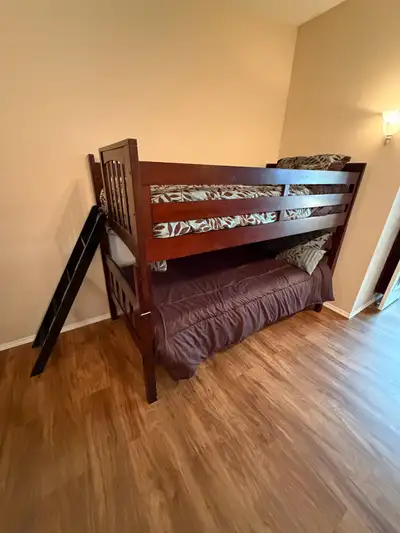 Mattresses are brand new have never been used. This bunkbed is sturdy. Well Built & has a ladder! Pi...