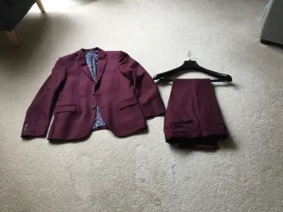 Man’s suit bought at TipTop, View more