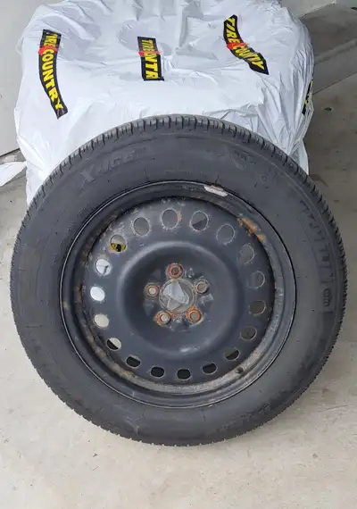 Michelin X-Ice Snow Tires on 18 inch steel rims. Tire size 225/60. Used 3 seasons with plenty of lif...