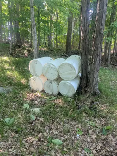 6 plastic barrels for dock $100 for all or $20 each they are at sand Lake