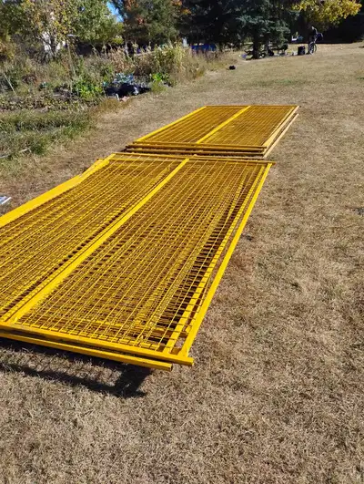I am selling 14 temporary construction fencing panels, each measuring 6ft x 9ft, complete with base...